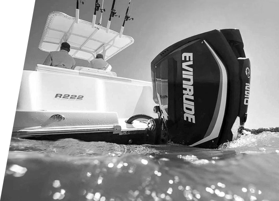 Engineers collaborating at a whiteboard.