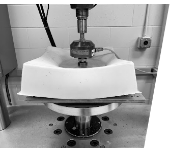 A component undergoing cycle testing on a test stand.